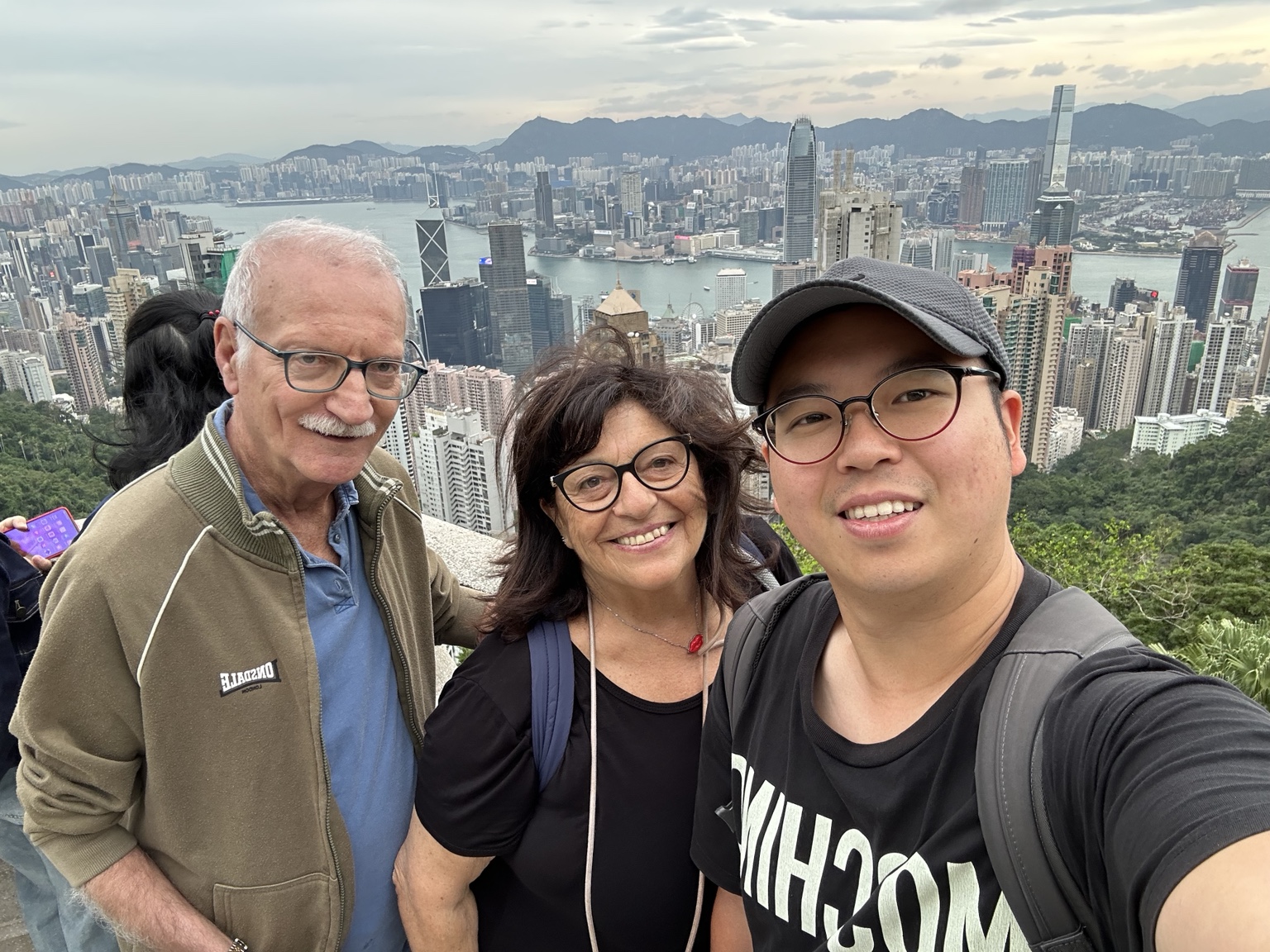 Giacomo con turisti al Victoria Peak